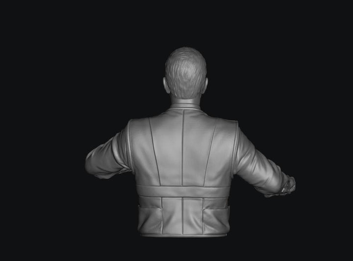 Grey 3D render of a male train driver miniature, showing the back view of his jacket and detailed hair texture.