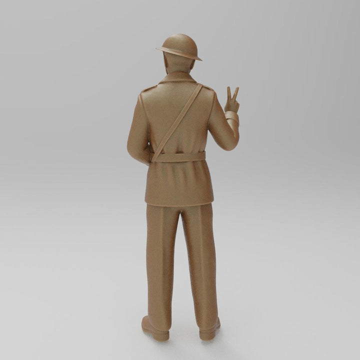 Unpainted terracotta resin miniature of a WW2 ARP warden in a helmet, standing and making a victory sign gesture.