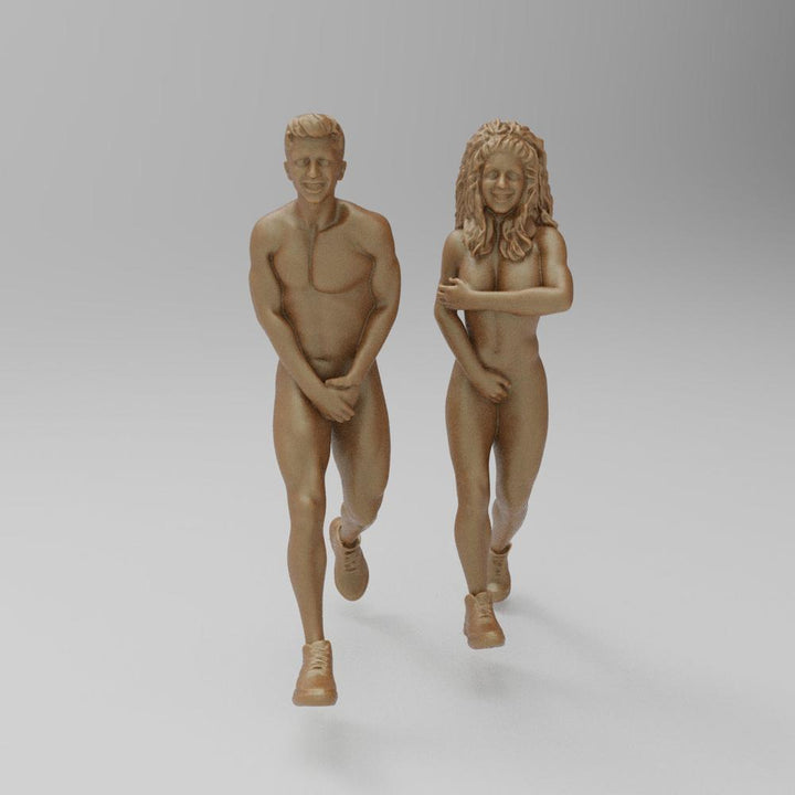 Unpainted terracotta resin 3D printed scale model of a man and woman running, designed for dioramas and hobbyists.