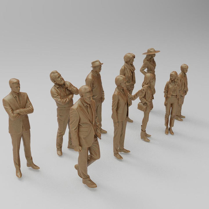 Unpainted terracotta-colored 3D printed miniature figures of a diverse group of people in various casual and formal poses.