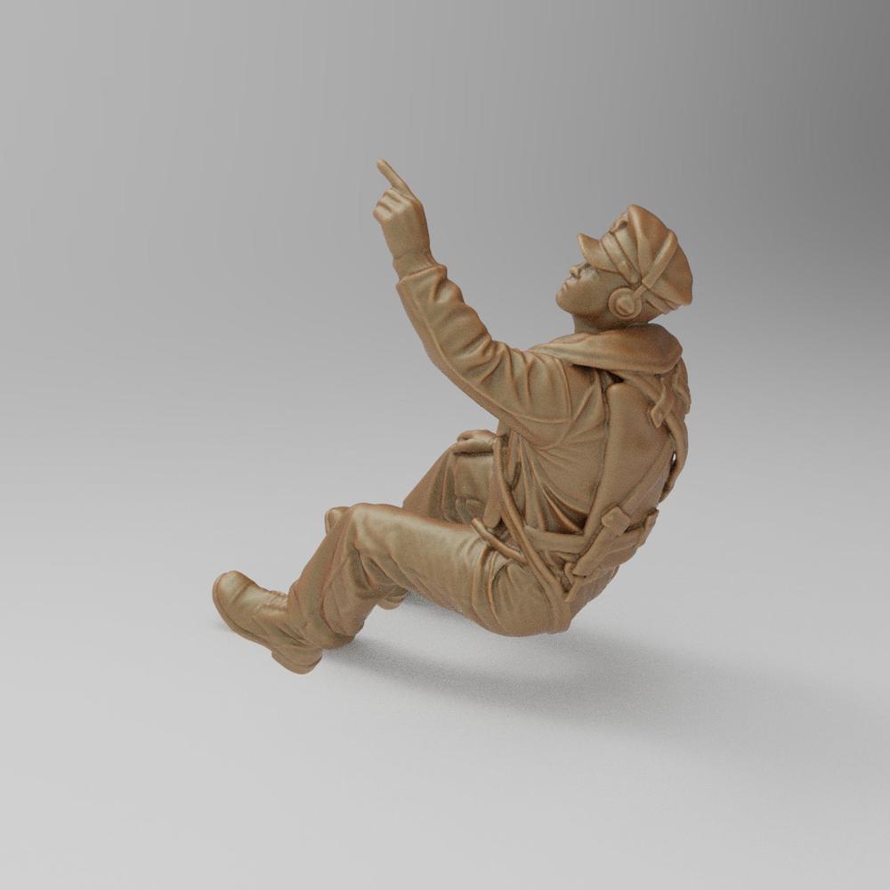 Unpainted 3D printed resin miniature of a seated US WW2 co-pilot pointing upward, in a clay-colored finish.