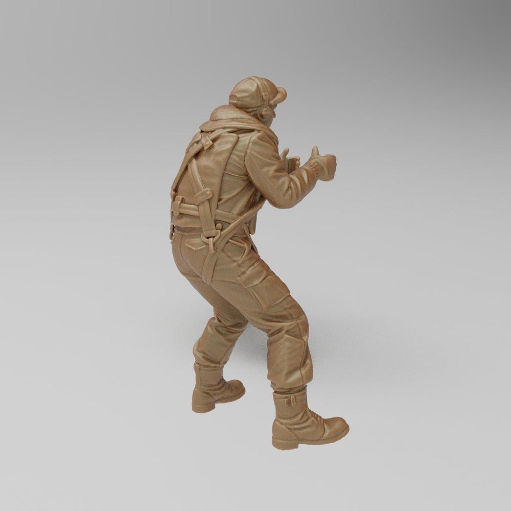 Unpainted 3D printed resin miniature of a WW2 US bomber waist gunner in flight gear, shown in a clay-colored finish.