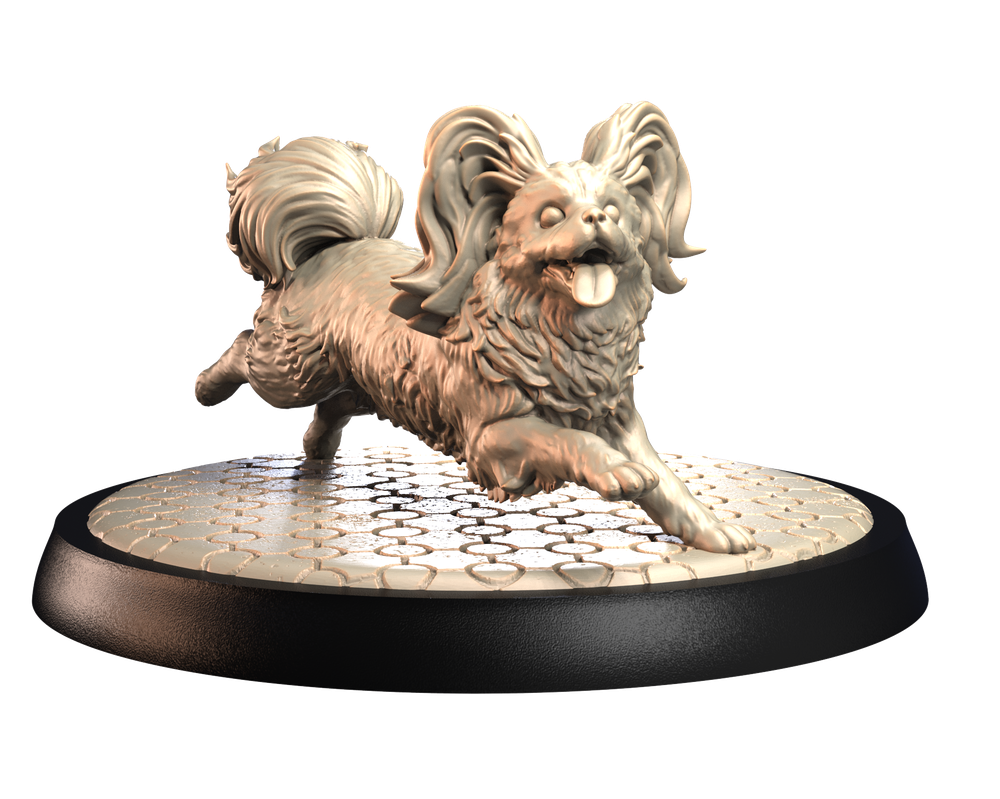 Unpainted 3D printed resin miniature of a running Papillon dog on a textured cobblestone display base.