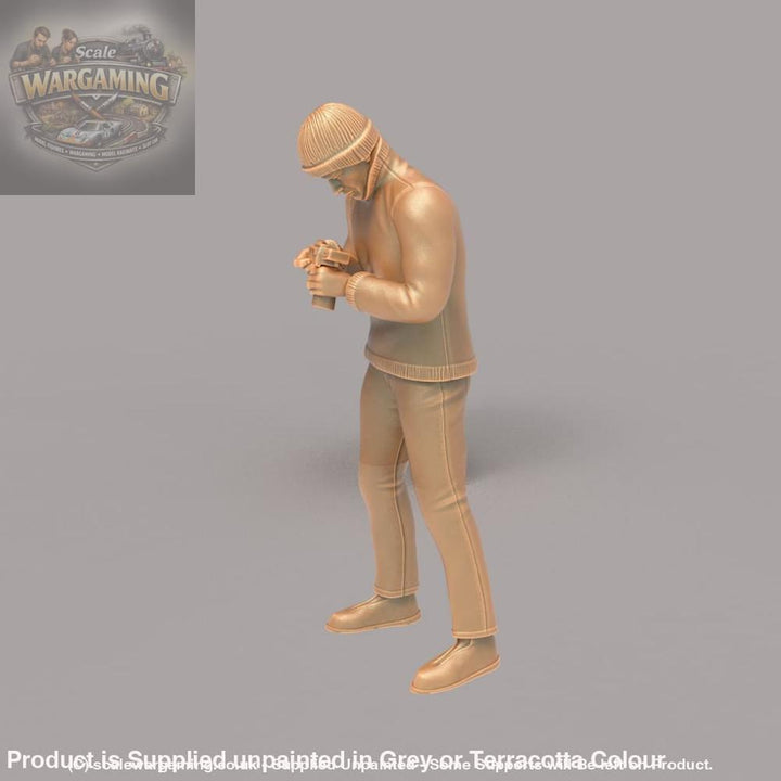 MM158 Male in Beanie Cap Checking Camera Figure