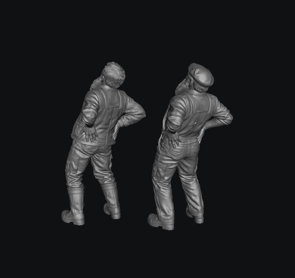 Two unpainted grey 3D-printed resin scale model figures of elderly farmers with back pain, shown from behind.