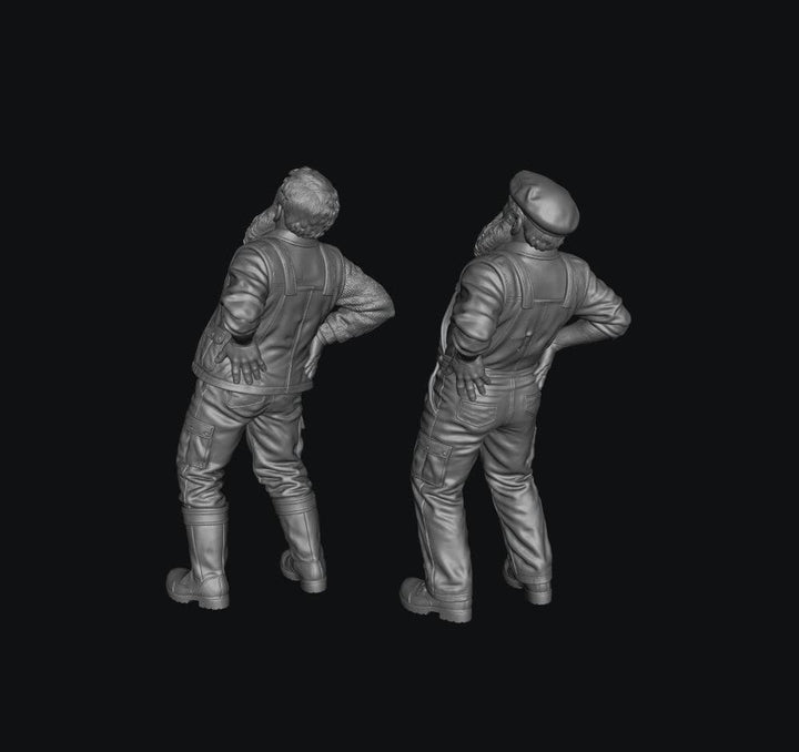 Two unpainted grey 3D-printed resin scale model figures of elderly farmers with back pain, shown from behind.