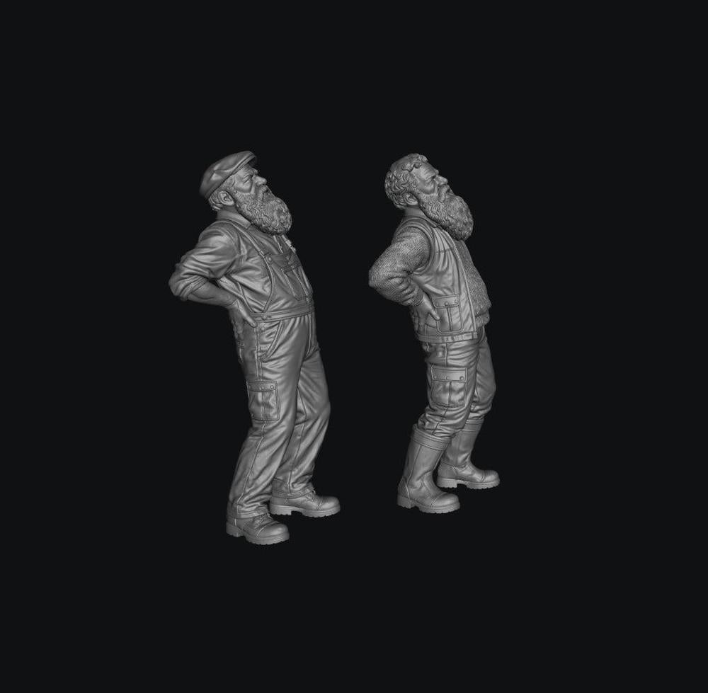 Two unpainted grey resin 3D-printed miniature figures of elderly bearded men with back pain in workwear.