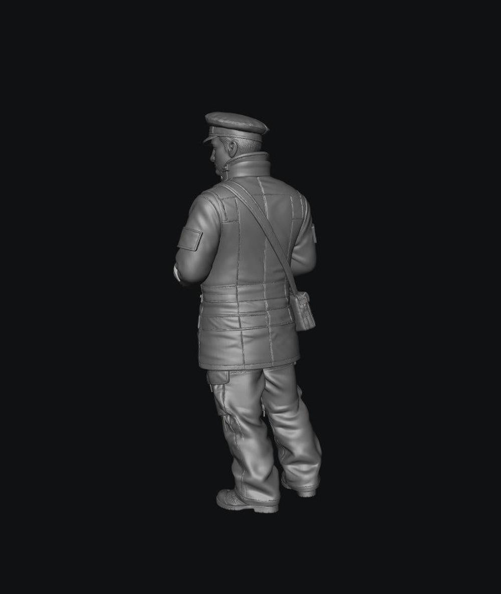 Unpainted 3D resin model of a male traffic warden in uniform, viewed from the back, for scale dioramas.