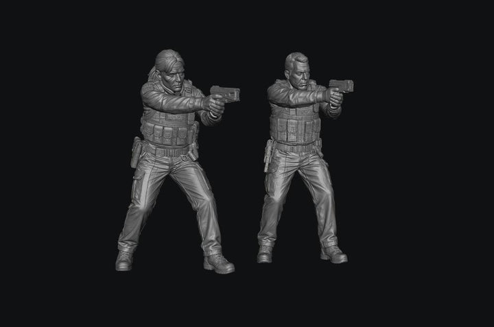 Two unpainted grey resin 3D printed police officer miniatures in tactical gear holding Tasers in a firing stance.