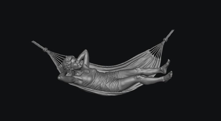 SMF9570 Female Relaxing in a Hammock