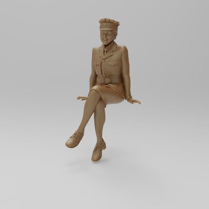 Unpainted 3D printed resin miniature of a sitting WW2 RAF WAAF figure in uniform, terracotta clay color.