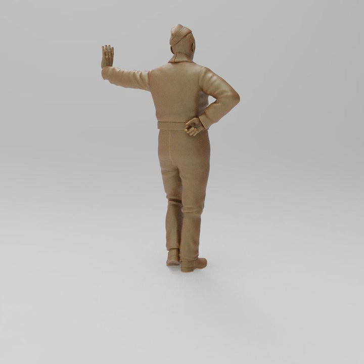 Unpainted 3D printed resin model of a WW2 RAF ground crew figure leaning left, shown in a clay-colored finish.