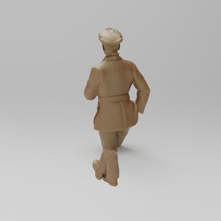 Unpainted 3D printed resin miniature of a WW2 RAF Sergeant in uniform, viewed from behind in terracotta clay color.