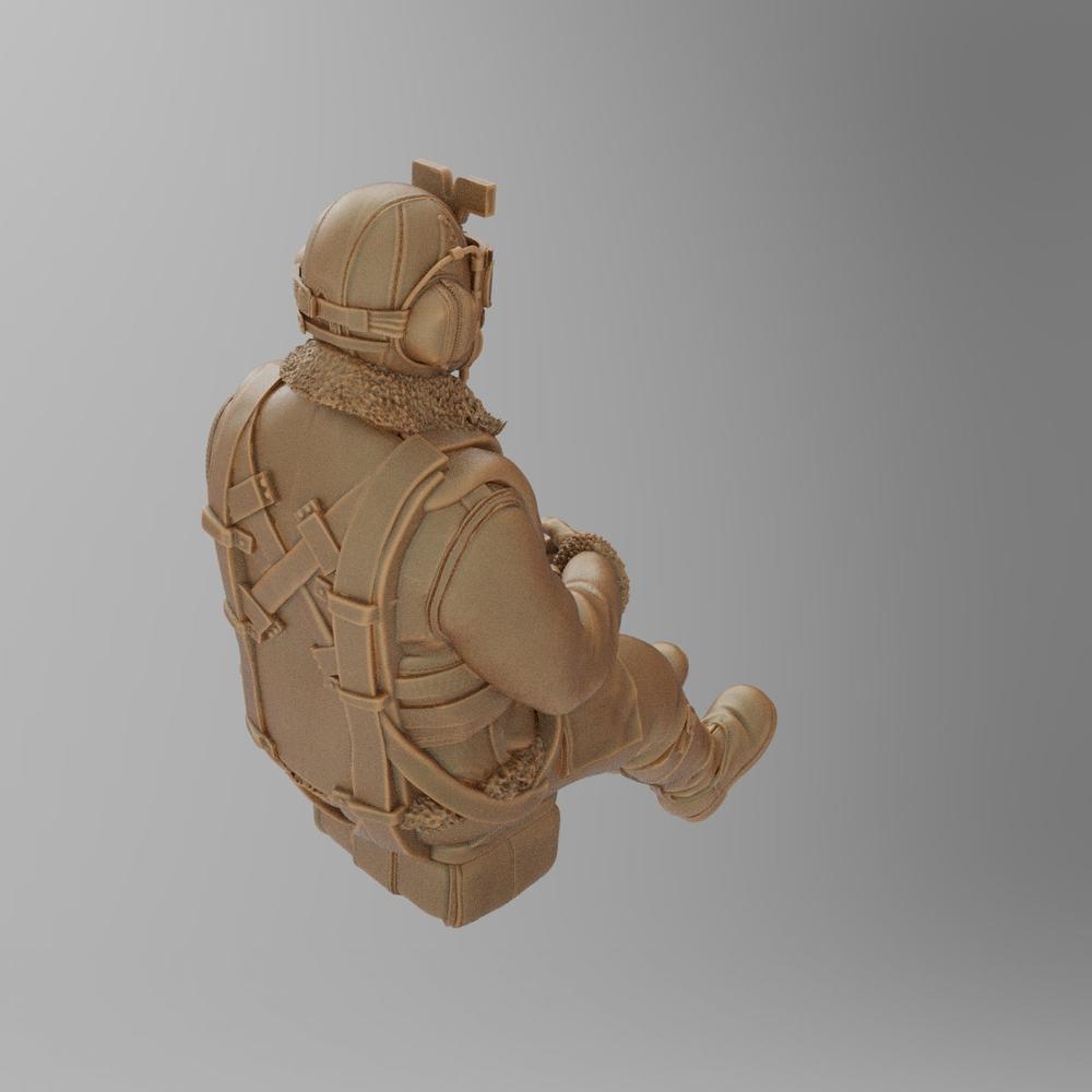 Unpainted 3D printed resin miniature of a WW2 RAF pilot in flight gear, shown from a rear three-quarter angle.
