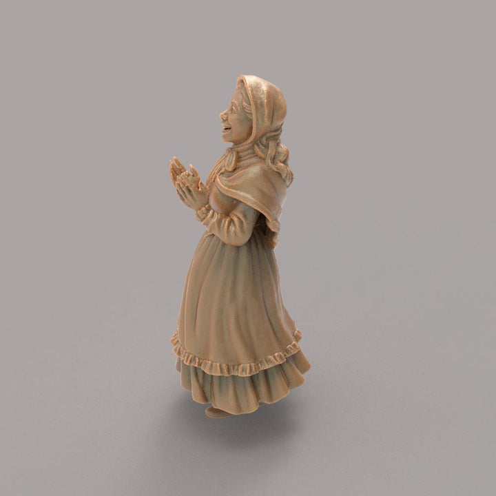 Unpainted terracotta-colored 3D resin miniature of a Victorian woman in a bonnet and shawl, clapping her hands.