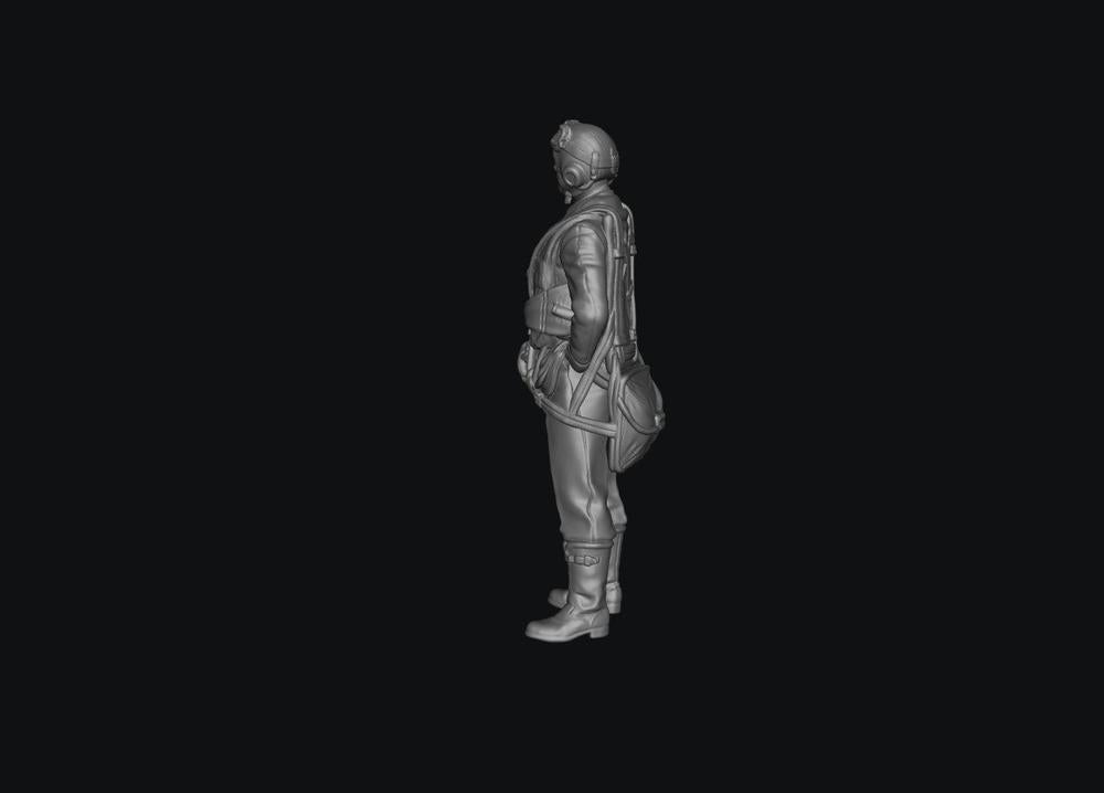 Unpainted grey resin 3D model of a WW2 RAF fighter pilot in uniform, side profile view for diorama building.