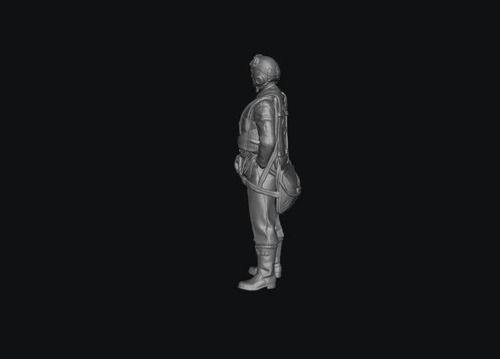 Unpainted grey resin 3D model of a WW2 RAF fighter pilot in uniform, side profile view for diorama building.