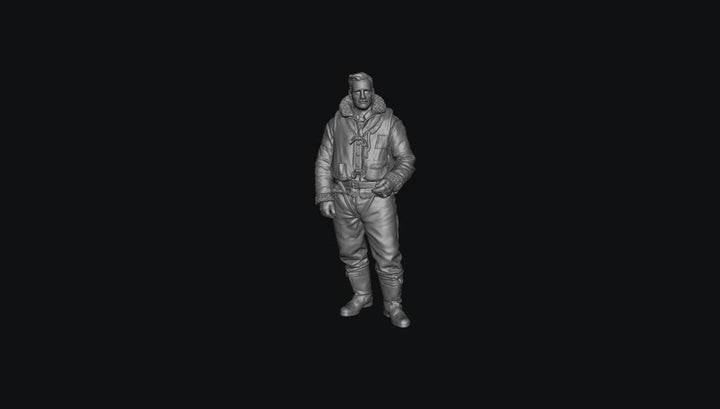 Unpainted grey 3D printed resin model of a WW2 RAF bomber crew member in flight gear, standing on a dark background.