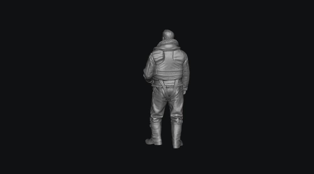 Unpainted grey 3D printed resin miniature of a WW2 RAF bomber crew member in flight gear, seen from behind.