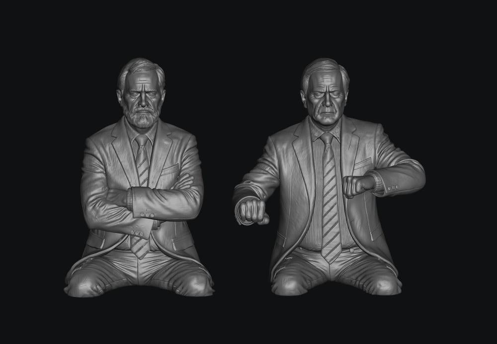 Two unpainted grey 3D-printed resin scale model figures of late BR train crew members in suits.