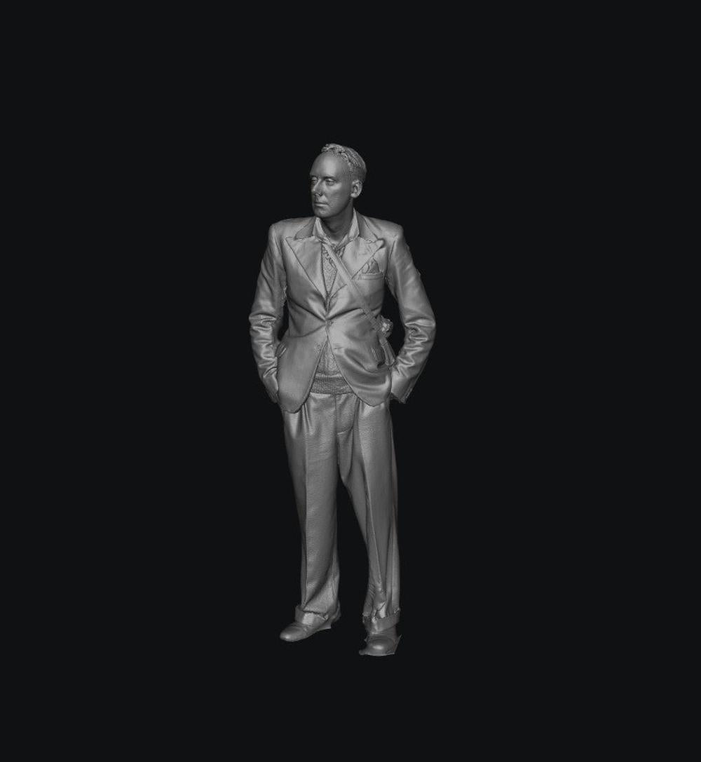 3D render of an unpainted grey resin 1940s male figure in a smart suit standing with hands in pockets.