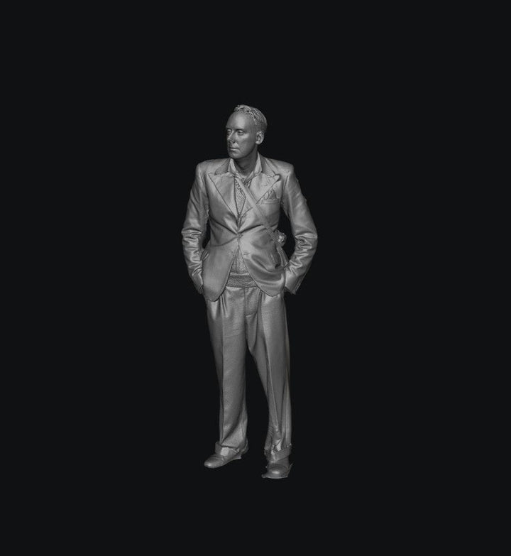 3D render of an unpainted grey resin 1940s male figure in a smart suit standing with hands in pockets.