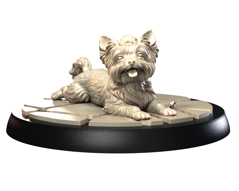 Unpainted 3D printed resin Yorkshire Terrier miniature lying on a cobblestone base, detailed scale model for dioramas.