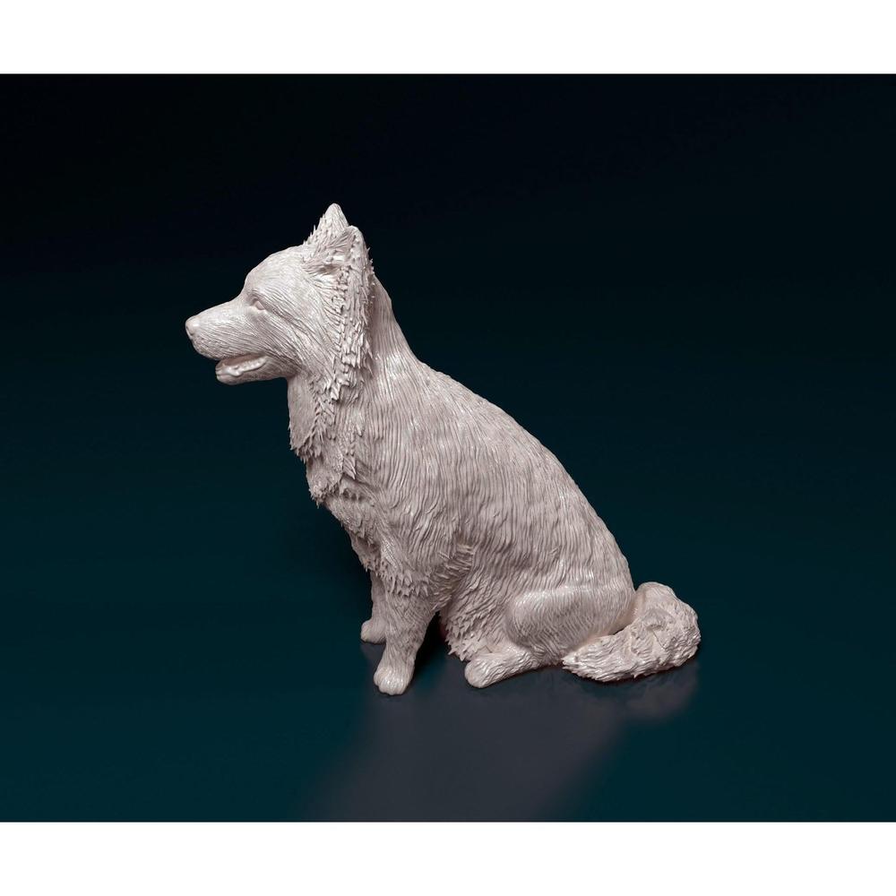 Unpainted 3D printed resin model of a sitting Border Collie with detailed fur texture on a dark background.
