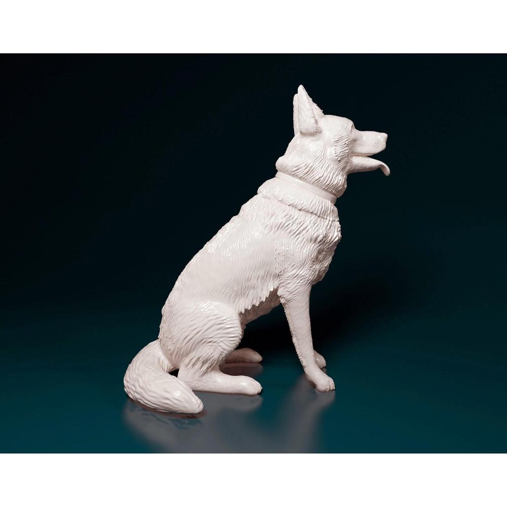 Unpainted white resin 3D printed model of a German Shepherd sitting, featuring detailed fur texture.
