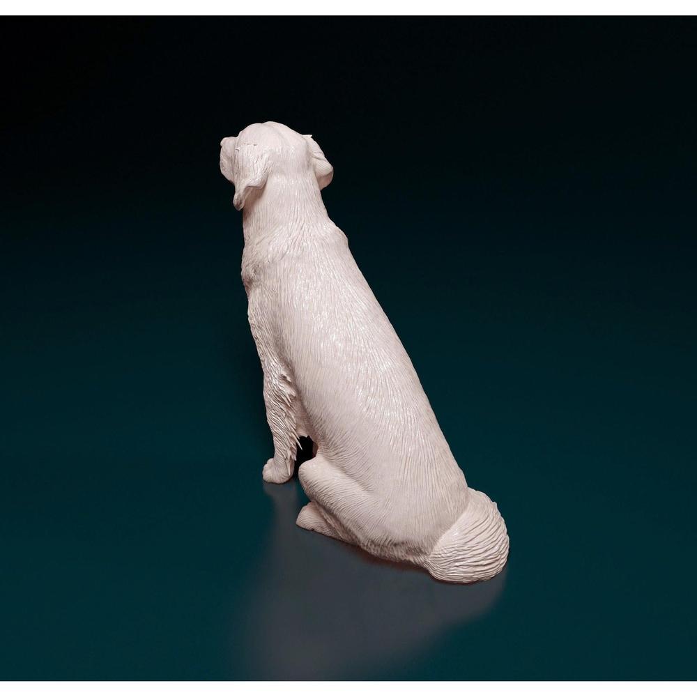 Unpainted 3D printed resin miniature of a sitting Golden Retriever, showing detailed fur texture in a light grey finish.