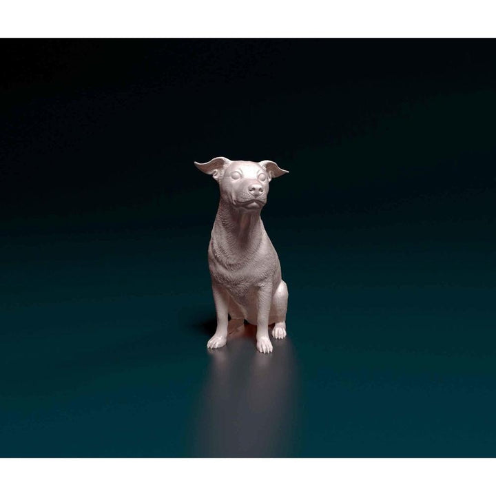 Unpainted 3D printed resin miniature of a sitting Jack Russell terrier with detailed fur texture on a dark background.