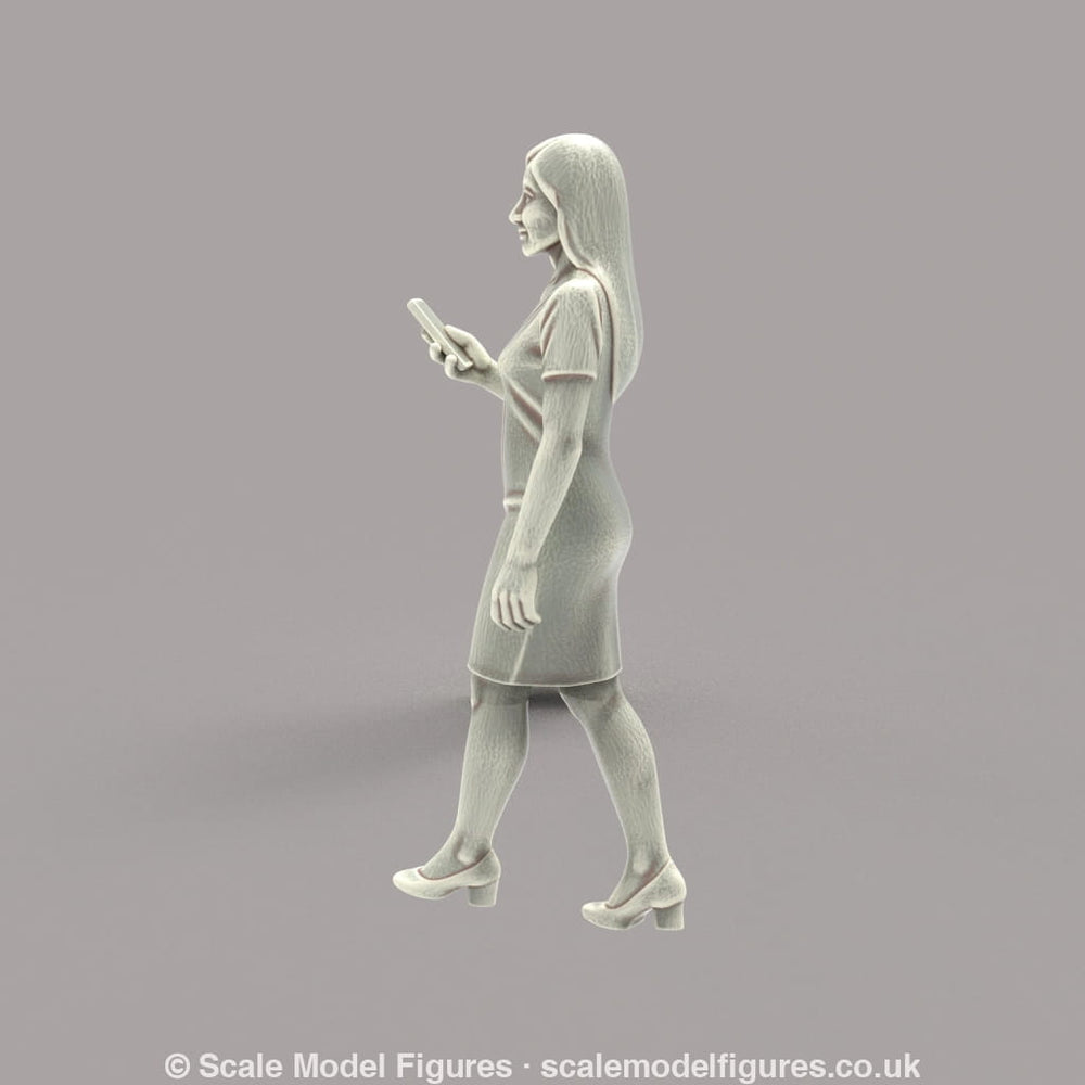 MM4182 Female with Mobile Phone Walking Figure
