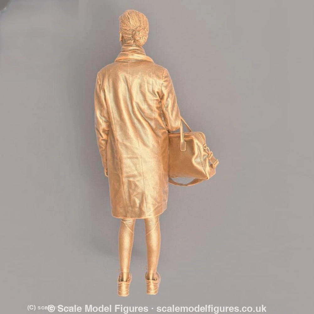 MM446 Female In Long Coat and Large Bag on Arm Figure