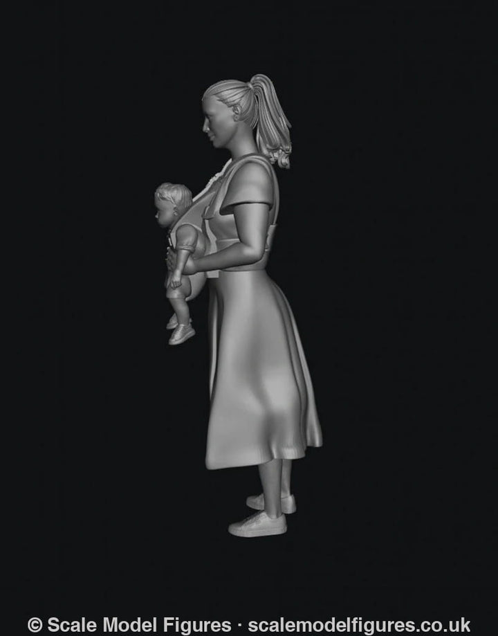 Unpainted grey 3D resin scale model of a woman in a dress carrying a baby in a front-facing carrier.