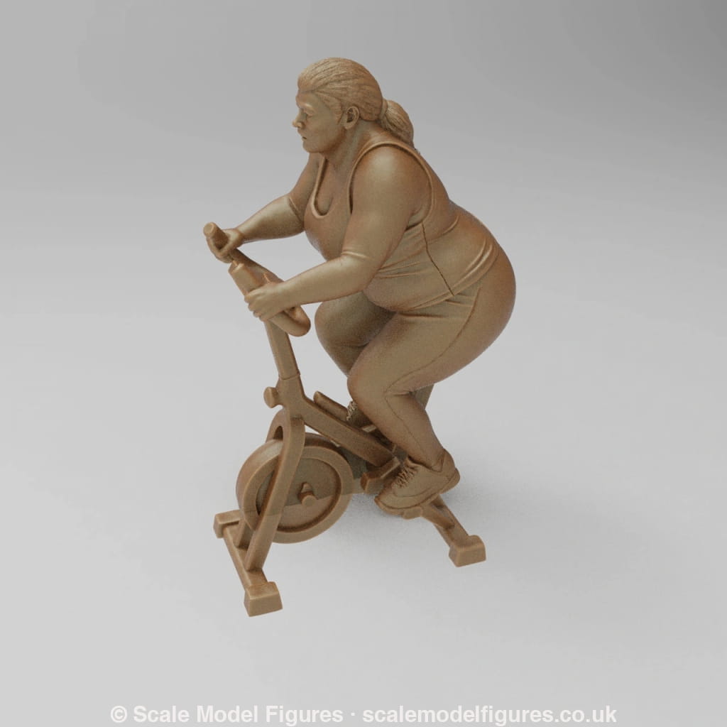 SW9082 Large Female on Exercise Bike - Figure