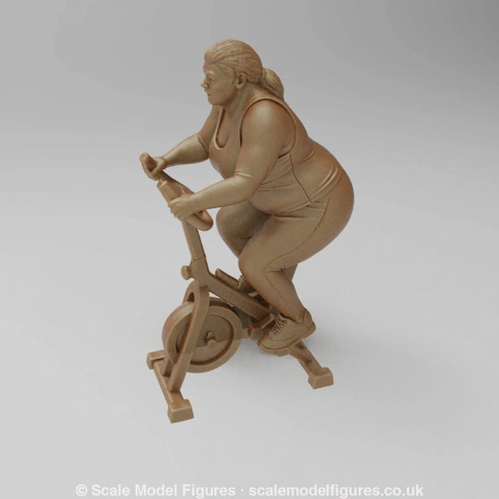 SW9082 Large Female on Exercise Bike - Figure