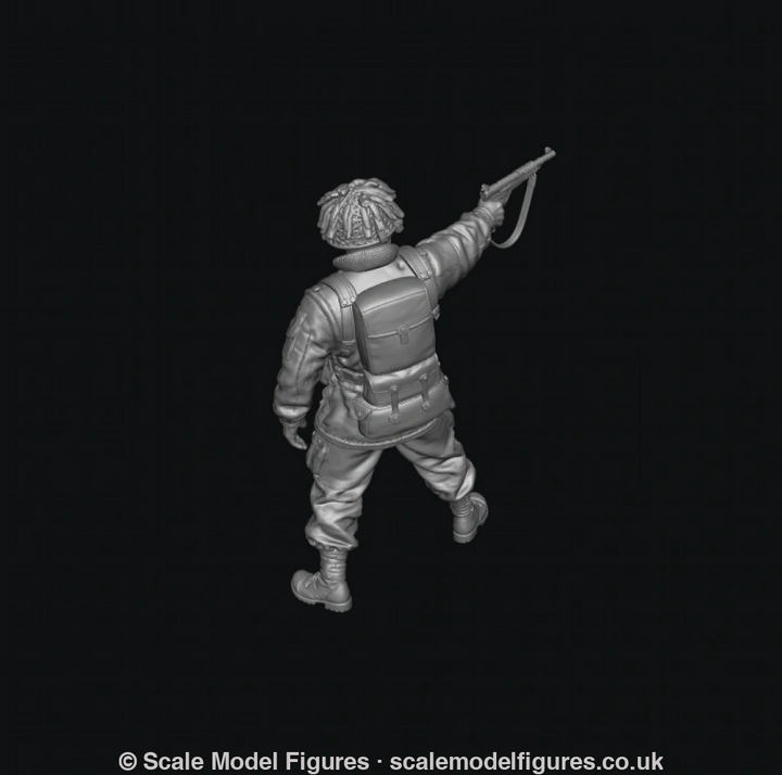 A grayscale 3D-rendered miniature figurine of a soldier in combat gear, shown from the back and side while aiming a rifle, on a solid black background.